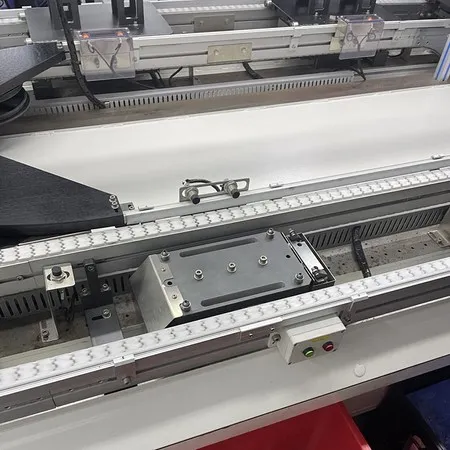 Цепной разгрузочный конвейер для паллет